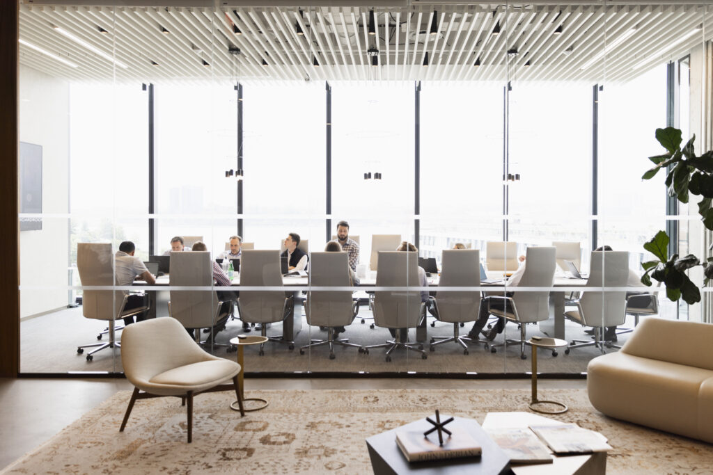 people sitting meeting in a board room